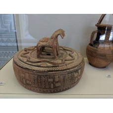 Geometric pyxis with horse and snake design